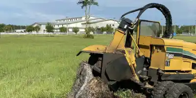 Tractor positioned in grassy area | Elite Tree Surgeons Telford
